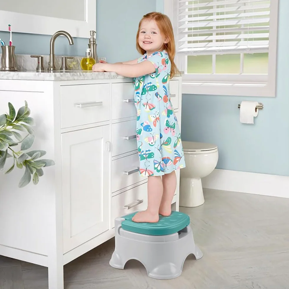 Fisher-Price Nocnik 3-w-1 Nocniczek i podnóżek do nauki korzystania z toalety, ze zdejmowaną nakładką na sedes i zbiorniczkiem do mycia, HPY87