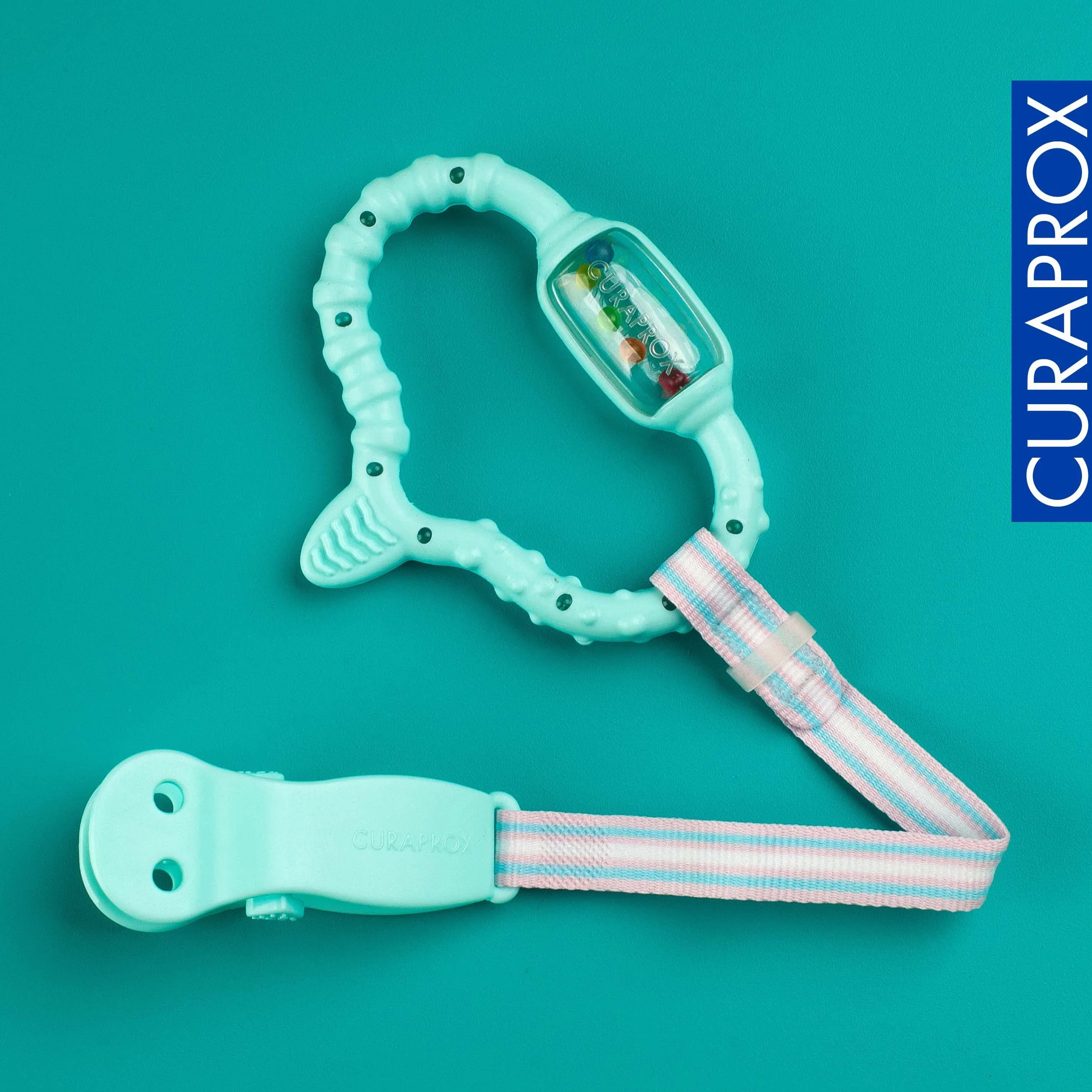 Curaprox Baby ząbkowany Pierścień-Dla Niemowląt 0-24 miesięcy/łagodzi dyskomfort ząbkowania i stymuluje rozwój sensoryczny | bez BPA, turkusowy, ze szczoteczką treningową/Made in Switzerland