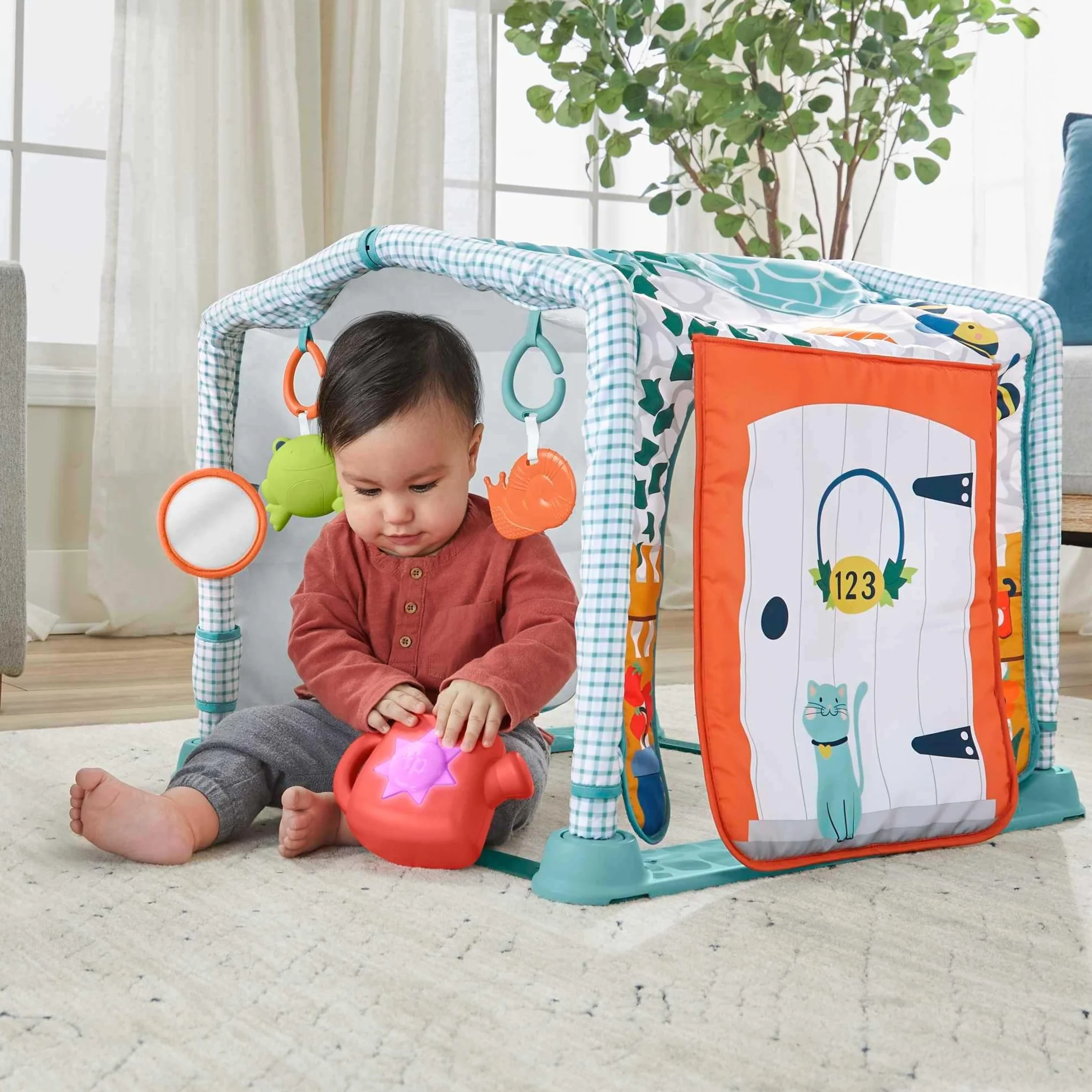 Fisher-Price Edukacyjna mata 3 w 1 z dźwiękami Domek Odkrywcy, mata do zabawy na brzuszku i tunel do raczkowania, od niemowlaka po starsze dziecko, HJK45