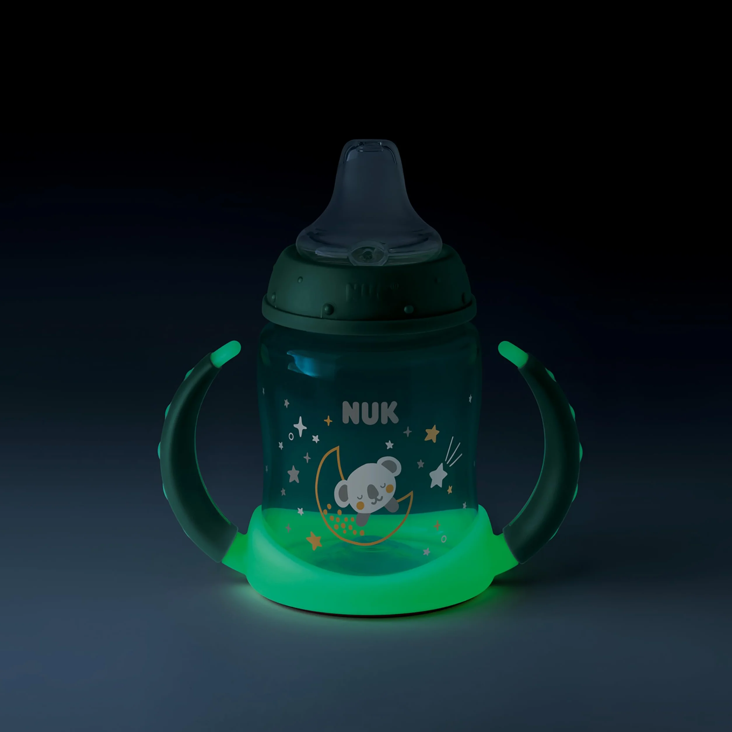 Kubek niekapek NUK First Choice Night | Wiek: od 6 do 18 miesiąca | 150 ml | Fosforyzujący kolor | Uchwyty i ortodontyczny silikonowy dzióbek| System antykolkowy | Nie zawiera bisfenolu A | Zielony